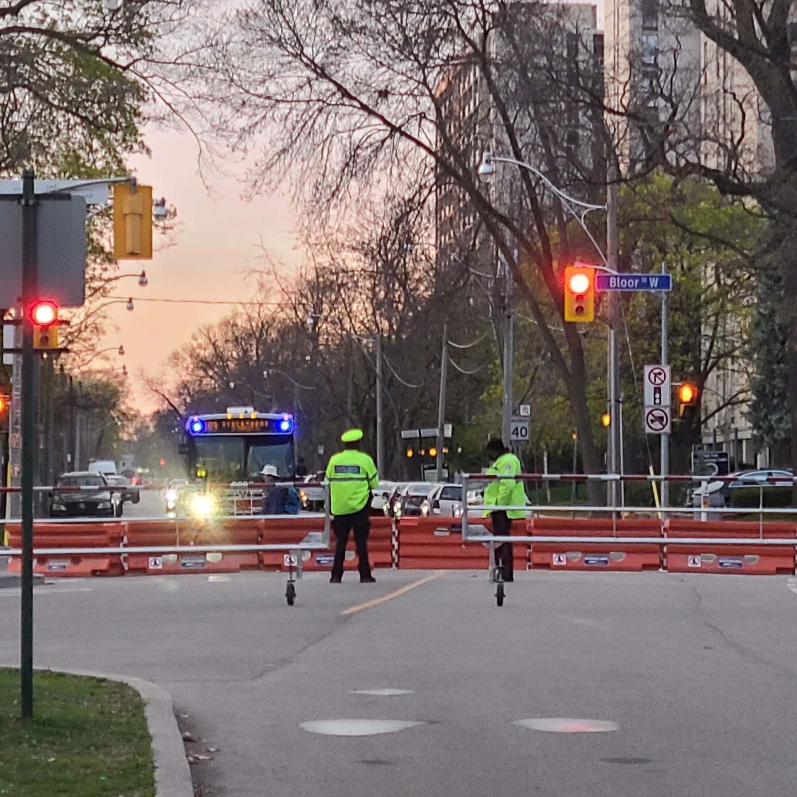 Cherry blossoms 2021 Covid-19 - Police guarding gate at High Park